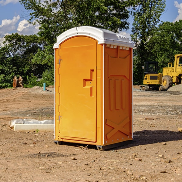 how often are the portable restrooms cleaned and serviced during a rental period in Lenawee County Michigan